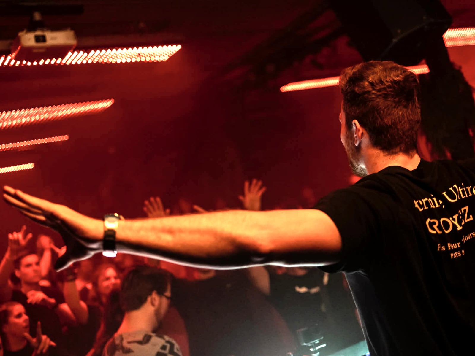 A-RIZE reaching out over the barrier towards the front row